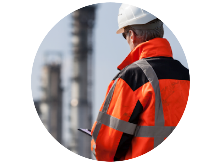 Worker in safety gear at a power plant