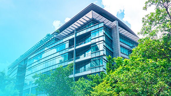 Modern office building surrounded by greenery