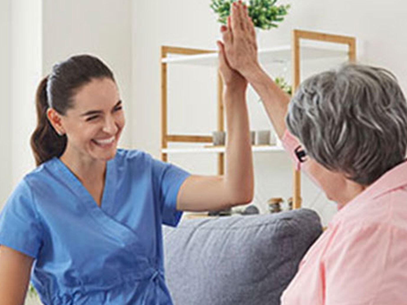 elder giving hifi with nurse