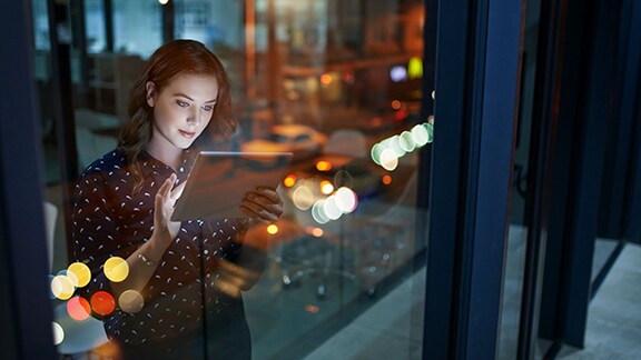A person looking at a tablet