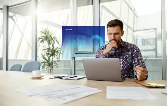 A holograph of a OpenBlue graphic of person person looking into this laptop