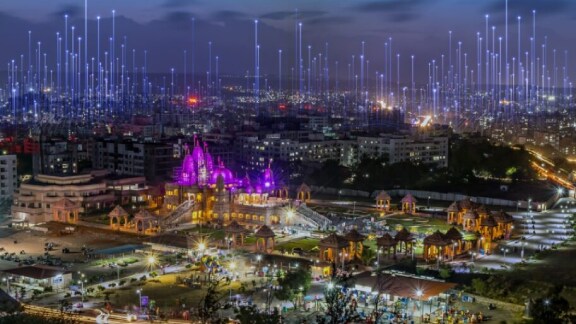 Aerial view of a city lit up at night