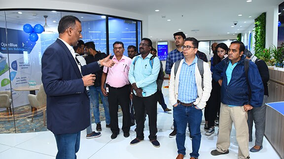 People gathered at the OpenBlue Innovation Center in Bengaluru, India