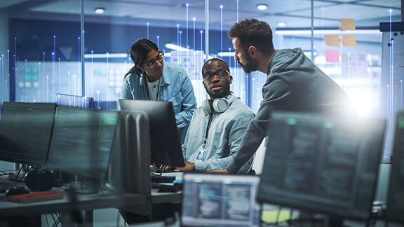 Three people discussing topic in cabin