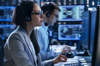 Two people working at the computer