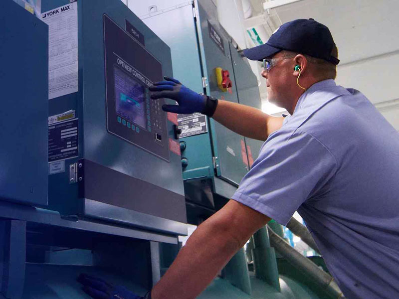 HVAC engineer operating controls